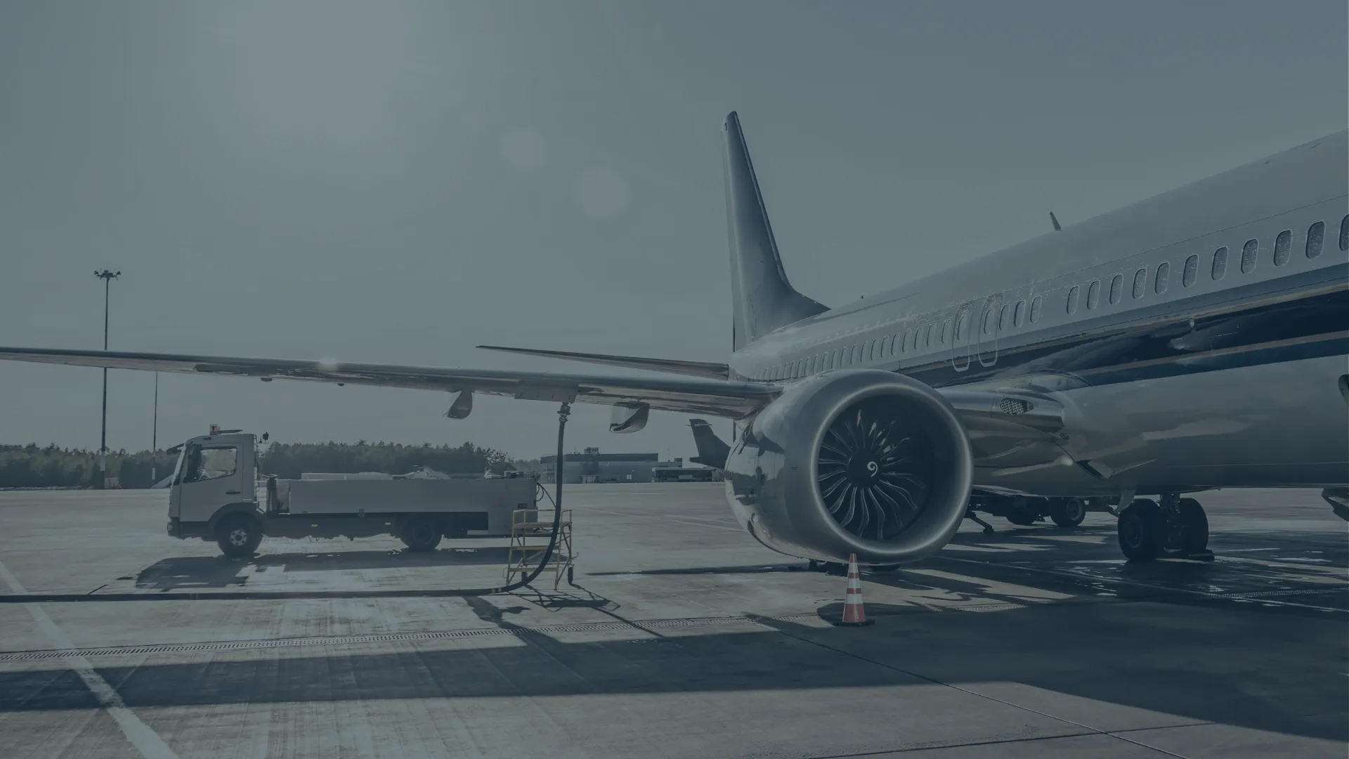 An aircraft being refuelled on the tarmac