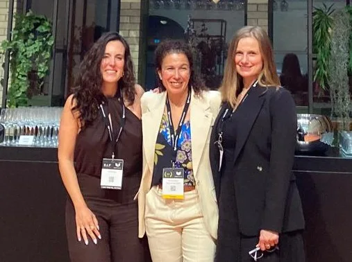 Three members of the Women in SAF community at an industry event